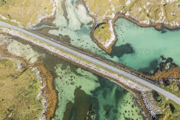 Aerial view of road on a dam connecting islands at the norwegian coast, Norway, Europe