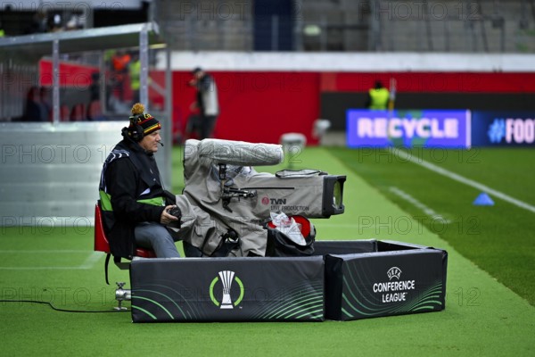 TV camera, cameraman, UEFA Conference League logo, Voith-Arena, Heidenheim, Baden-Württemberg, Germany, Europe