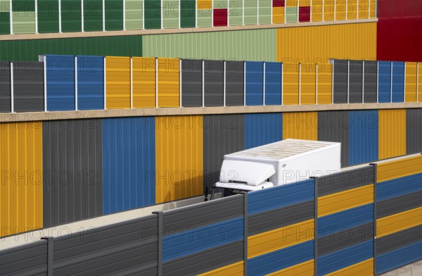 Colourful noise barriers on the A52 motorway, at the Essen-Rüttenscheid junction, the noise barriers were rebuilt in a colourful design as part of the motorway renovation, North Rhine-Westphalia, Germany, Europe
