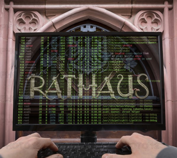 Symbolic image hacker, cyber attack on public buildings, administrations, institutions, town hall, authorities, digital blackmail, data theft, online criminal offences, cyber extortion, ransomware