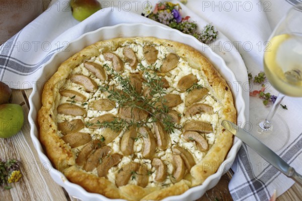 Tart with Gaishirtle and sheep's cheese, Stuttgarter Gaishirtle, pear variety, fruit, table decoration, thyme, baking, typical Swabian, Swabian cuisine, traditional cuisine reinterpreted, vegetarian, food photography, studio, Germany, Europe