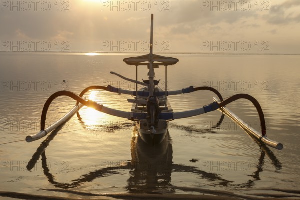 Fishing outriggers at dawn, Sanur, Bali, Indonesia, Asia