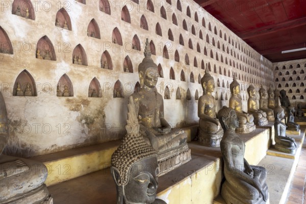 Ancient Buddha statues in the courtyard of Wat Si Saket, Vientiane, Vientiane province, Laos, Asia