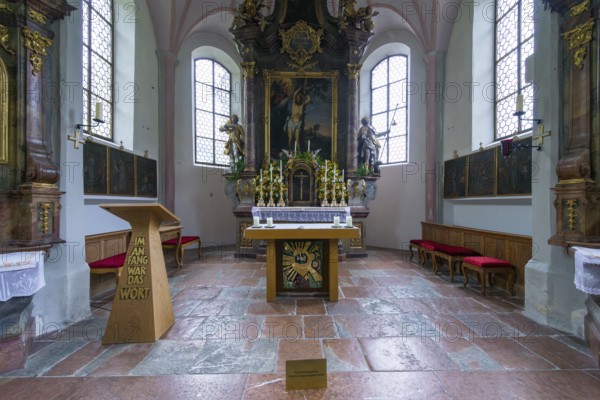 Parish church of St Sebastian with richly decorated altar, statues of saints and paintings, framed by a vaulted ceiling and large windows, Ramsau, Berchtesgadener Land, Bavaria, Germany, Europe