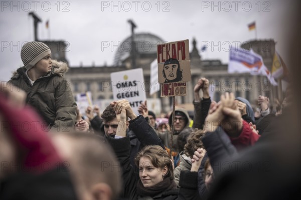 150, 000 people gather around the Bundestag in Berlin to build a human wall against the shift to the right in society. We are the firewall chanted demonstrators from a wide range of social groups. Recordings on 03.02.2024 in Berlin