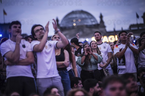 Scenes in the fan zone on Platz der Republik in front of the Reichstag building taken in Berlin, 29 June 2024 during the broadcast of the football match between Denmark and Germany