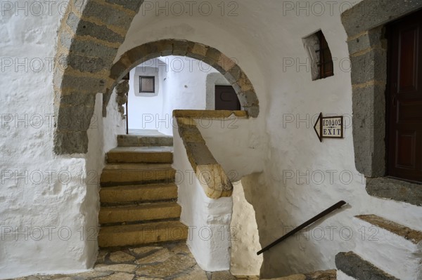 Interior of a historic monastery with stone stairs and arches, Inside the monastery, Agiou Theologou Monastery, Chora, Patmos, Dodecanese, Greek Islands, Greece, Europe