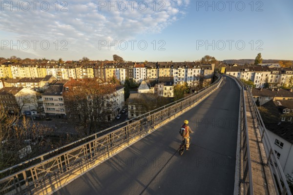 The Nordbahntrasse, a cycle path, footpath, on a former 22 km long railway line, along the west-east axis of Wuppertal, on the northern slope, branch of the Schwarzbachtrasse, with many tunnels, viaducts and views of the city, Wuppertal, North Rhine-Westphalia, Germany, Europe