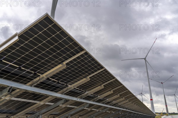 Wind farm and large-scale photovoltaic system, north-east of Bad Wünnenberg, near the village of Elisenhof, on the A44 motorway, North Rhine-Westphalia, Germany, Europe