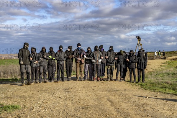 Start of the eviction of the hamlet Lützerath at the lignite mine Garzweiler 2, activists try to obstruct the preparation for the upcoming eviction of the site, which is occupied by climate protection activists, the energy company RWE prepares the construction of work roads, protected by the police, North Rhine-Westphalia, Germany, Europe