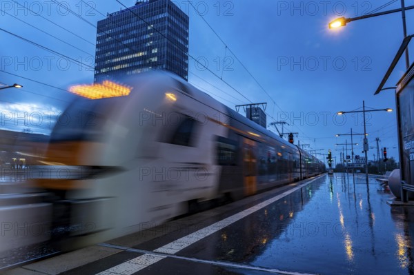 RRX train, regional express, Rhine-Ruhr-Express, train traffic, city centre skyline, Essen central station, North Rhine-Westphalia, Germany, Europe