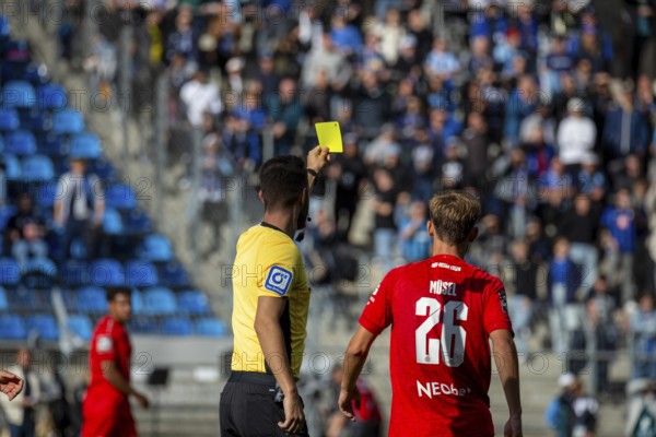 Football 3rd division, season 2024/25, matchday 8: Waldhof Mannheim vs Rot-Weiß Essen. Picture: Torben Müsel (26, Essen) is shown a yellow card