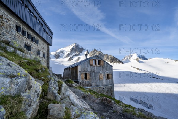 Old and new mountain hut Refuge Albert 1er, high alpine mountain landscape, summit of the Aiguille de Chardonnet and Glacier du Tour, glacier and mountain peaks, Chamonix, Haute-Savoie, France, Europe