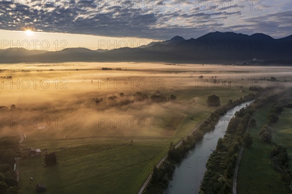 Aerial view of a river in front of mountains in the morning light, fog, autumn, Loisach, view of Benediktenwand, Alpine foothills, Upper Bavaria, Bavaria, Germany, Europe