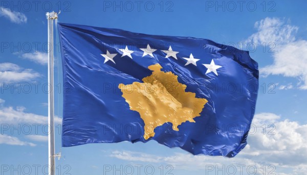 Flags, the national flag of Kosovo flutters in the wind