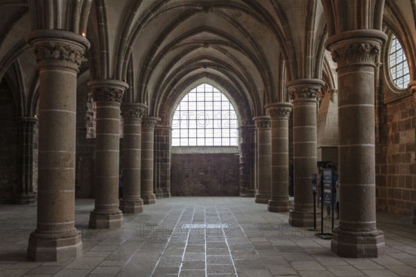 Gothic room with high columns and large windows, majestic, Le Mont-Saint-Michel