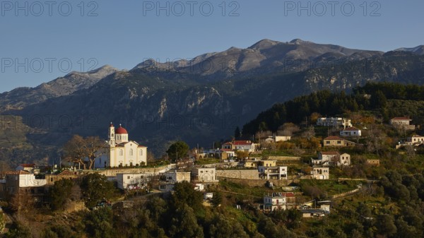 A small village in the mountains with a striking church at sunset, surrounded by mountains, Lakki village, Lefka Ori, White Mountains, mountain massif, west, Crete, Greece, Europe