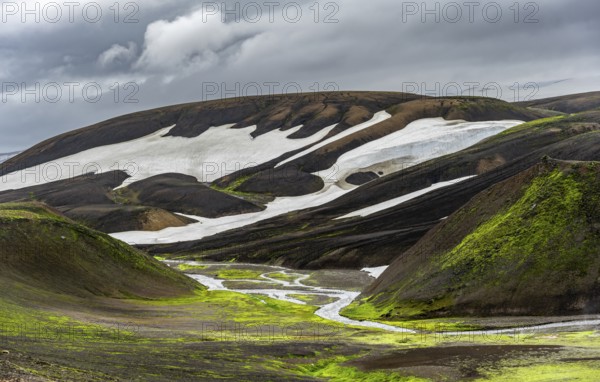 Colourful volcanic landscape with hills and snow, volcanic hot springs, Laugavegur trekking trail, Landmannalaugar, Fjallabak Nature Reserve, Icelandic Highlands, Suðurland, Iceland, Europe