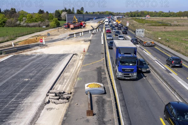Motorway construction site, the A57 is being widened to 6 lanes on the section between the Meerbusch motorway junction and the Oppum junction, traffic runs parallel on 2 narrowed lanes, Krefeld, North Rhine-Westphalia, Germany, Europe