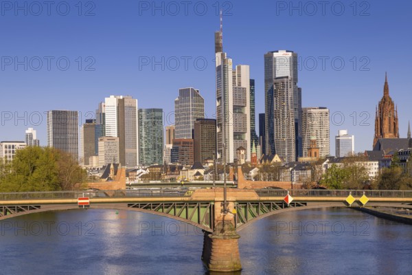 The sun shines on the skyscrapers of Frankfurt's banking skyline in the morning, Frankfurt am Main, Hesse, Germany, Europe