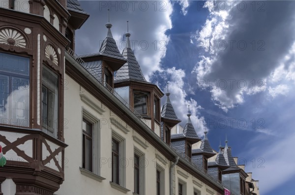 Roof bay with pointed spires on a historic inn, built in 1838, Weingasse 1, Bad Kissingen, Lower Franconia, Bavaria, Germany, Europe