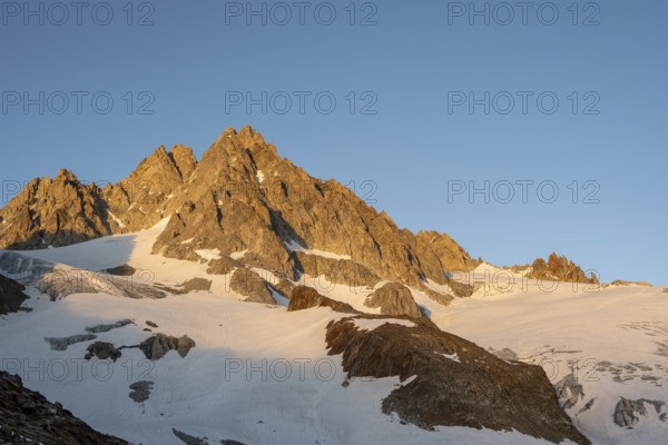 Rocky mountain peak, summit of the Aiguille de Tour in the evening light at sunset, Chamonix, Haute-Savoie, France, Europe