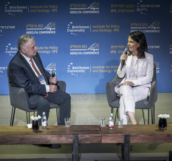 Annalena Bärbock (Alliance 90/The Greens), Federal Foreign Minister, photographed during her trip to Israel. Here taking part in the '21st Herzliya Conference, On the path of Strategic Surprises'. On stage with the former Israeli ambassador to the Federal Republic of Germany, Jeremy Issacharoff.