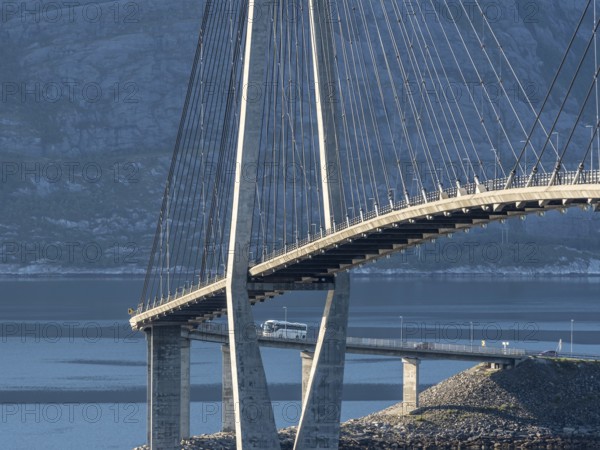 Helgeland bridge, connecting Sandnessjøen with the norwegian mainland, tourbus on bridge, Norway, Europe