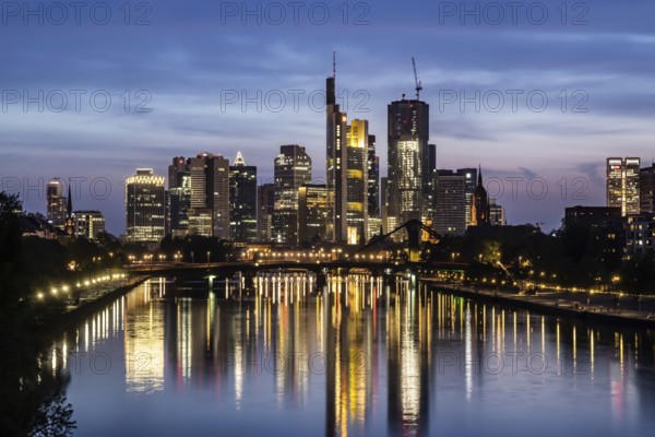 Skyline of Frankfurt am Main in the evening, skyscrapers in the banking district in the evening. Frankfurt am Main, Hesse, Germany, Europe