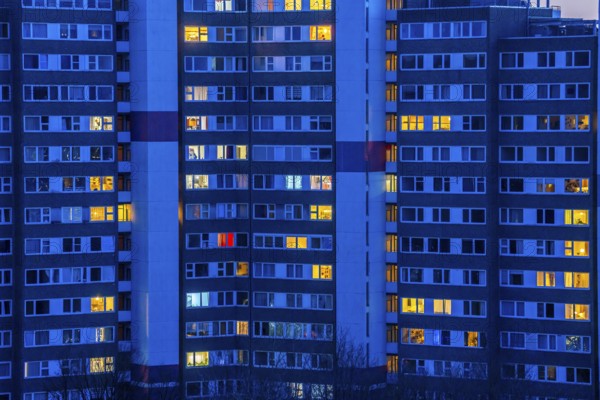 High-rise buildings in the Bensberg residential park, Bergisch-Gladbach, 18-storey housing estate with over 900 flats spread over 7 building complexes, dusk, illuminated windows, North Rhine-Westphalia, Germany, Europe