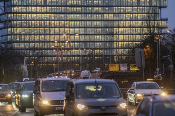 City centre traffic, Danziger Straße, B8, Düsseldorf, high-rise office building, evening traffic, North Rhine-Westphalia, Germany, Europe