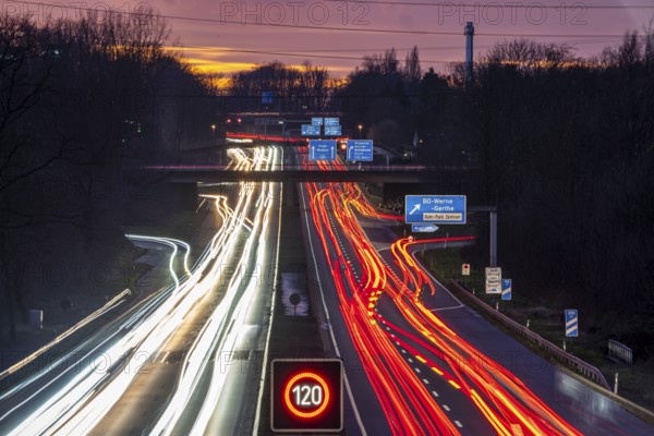 Motorway A40, Ruhrschnellweg, near Bochum, dense evening traffic, in front of the motorway junction Bochum, A43, view in west direction, North Rhine-Westphalia, Germany, Europe