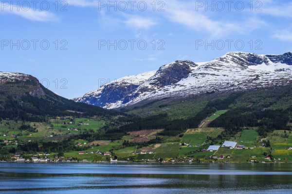 Mountains and Fjord over Norwegian Village, Olden, Innvikfjorden, Norway, Europe