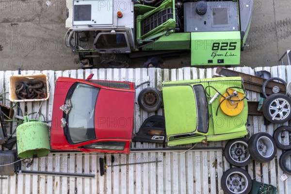 Metals are stored in a scrapyard in the harbour: scrap metal is a valuable raw material for recycling. Including a scrap-ready Trabant vehicle. Mannheim, Baden-Württemberg, Germany, Europe