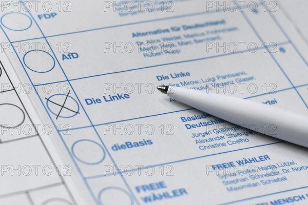 Germany - February 2025: Close up of cross made for political party die Linke on ballot paper for German federal parliament election called 'Bundestagswahl'