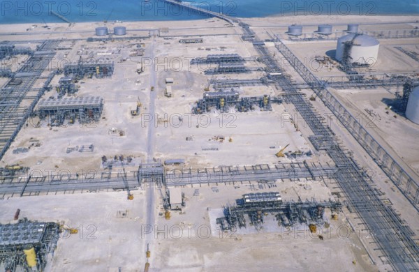 Oil industry in the Ras Tanura area, Saudi Arabia, refinery and storage tanks under construction 1979, Asia