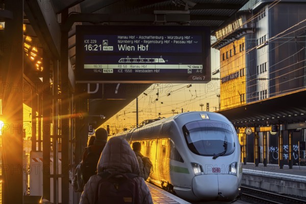 Platform in the evening, ICE arriving at the main station. International direct connection to Vienna. Frankfurt am Main, Hesse, Germany, Europe