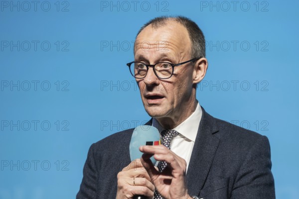 New Year's reception of the CDU with chancellor candidate Friedrich Merz in Künzelsau. The Federal Chairman of the CDU and Chairman of the CDU-CSU parliamentary group spoke to an audience of 2000 at the Carmen Würth Forum. Portrait during his speech on stage. Künzelsau, Baden-Württemberg, Germany, Europe