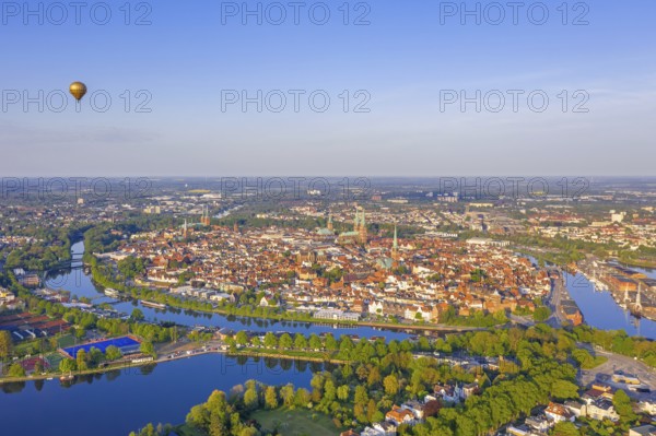 Aerial view over the river Trave and church towers in the old town of the Hanseatic City of Lübeck in spring, Schleswig-Holstein, Germany, Europe