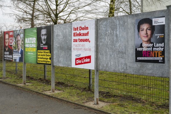 Board with election posters, SPD, CDU, Bündnis90 Die Grünen, FDP, Die Linke, BSW, Bundestag election 2025, Kamen, North Rhine-Westphalia, Germany, Europe