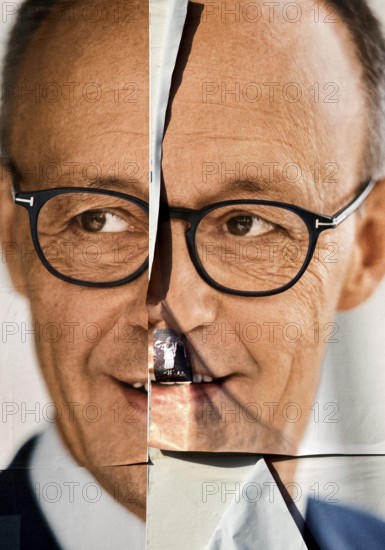 Torn large poster for the Bundestag election 2025 of the CDU with Friedrich Merz, Bochum, Ruhr area, Germany, Europe