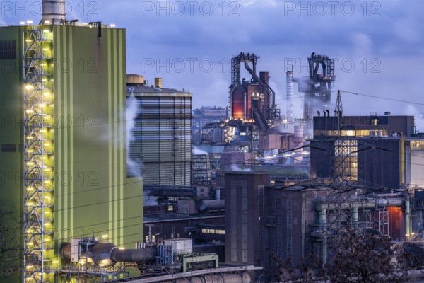 Panorama of the Thyssenkrupp Steel steelworks in Duisburg-Bruckhausen, in front the gas-fired power plant Hamborn, green facade of the boiler house Block5, in the centre the blast furnaces 8 and 9, North Rhine-Westphalia, Germany, Europe
