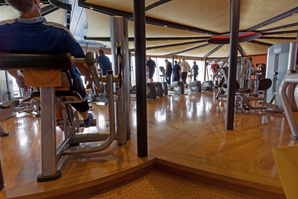 Active people in a fitness room