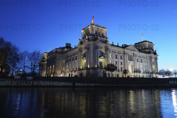 A view of the Bundestag in Berlin a few hours after polling closed and counting was underway in the German election of 2025. Berlin, Germany, Europe