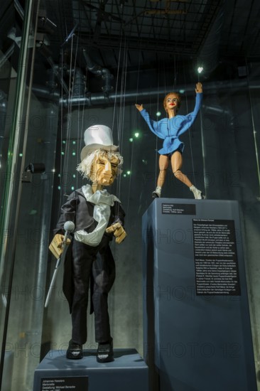 The puppet theatre collection of the Staatliche Kunstsammlungen Dresden (SKD), one of the largest of its kind in the world, will open its doors at its new location on 7 September: the power plant Mitte will not only house 12, 000 marionettes, hand puppets and other theatre figures on an area of around 2, 600 square metres, but also entire stages and the extensive archive, a total of over 100, 000 objects, will find an appropriate place. In future, there will be two exhibitions that can be visited independently of each other: The permanent basic exhibition will present highlights from the collection such as puppets developed at the Weimar Bauhaus and the Hohnsteiner Kasper, the ancestor of many modern German hand puppets. Puppet Johanns Heesters, Michael Benecke 1990 Puppet Katharina Witt, Rolf Wächtler 1980s, puppet theatre collection at the new location in power plant Mitte, Dresden, Saxony, Germany, Europe