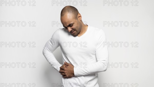 Front view man suffering from side pain