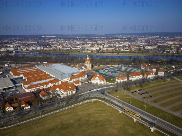 New Dresden Trade Fair Centre in the former Erlwein slaughterhouse.Dresden Sports High School on the right