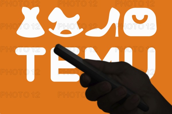Temu logo online marketplace ecommerce on a smartphone and computer in Stuttgart, Germany.
