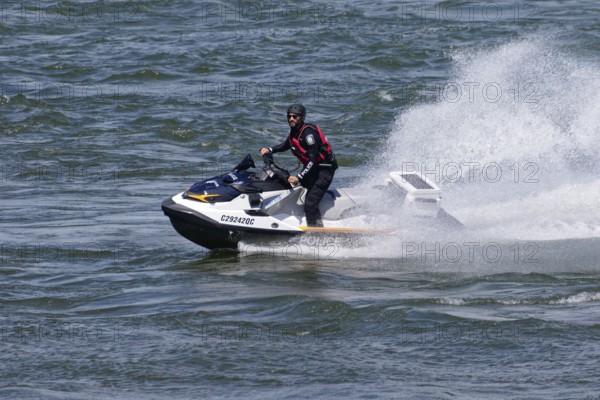 Police patrol with a water scooter, Saint Lawrence River, Montreal, Province of Quebec, Canada, North America