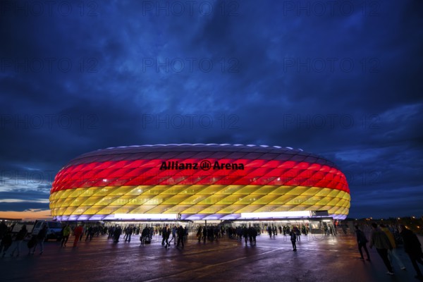 Night shot, stadium, illuminated, illuminated, in German national colours, black-red-gold, UEFA Nations League international match Germany vs. Netherlands, Allianz Arena, Munich, Bavaria, Germany, Europe